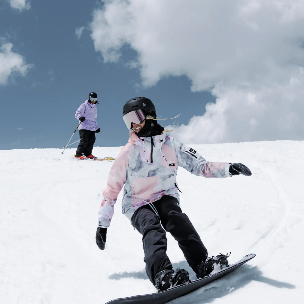 Woman snowboarding